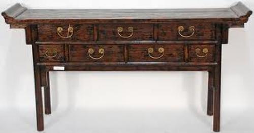 The rugged wood on this antique Chinese console or altar table is the focal 