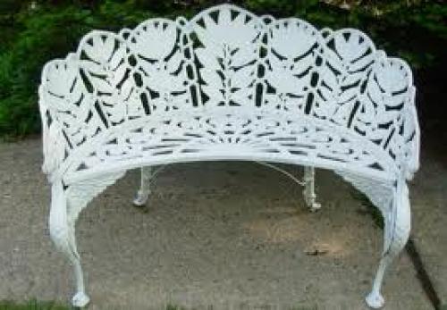 Antique; A Laurel Pattern Garden Bench, by Molla in cast aluminum dating from 1940