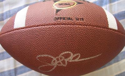 John Robinson (USC) autographed Wilson NCAA football