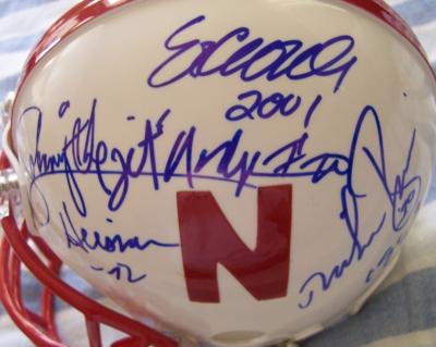 Eric Crouch Tom Osborne Johnny Rodgers Mike Rozier Ndamukong Suh autographed Nebraska mini helmet