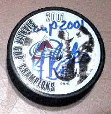 Ray Bourque autographed Colorado Avalanche Stanley Cup Champions puck inscribed Cup 2001