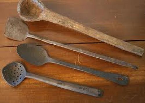 Antiques; primitive antique spoon collection.