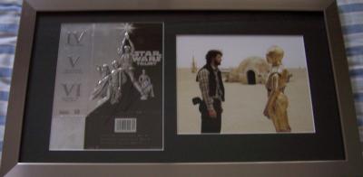 George Lucas autographed Star Wars Trilogy DVD box cover framed with photo