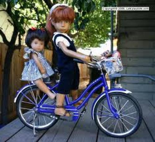 Dolls; The 16" redhead was made in Germany by Gotz, in 1970