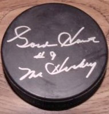 Gordie Howe autographed puck inscribed Mr. Hockey